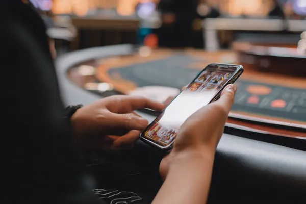 366BED Jackpot Slots — Spin for massive rewards A dramatic shot of winning sevens landing on a slot reel surrounded by shining gold coins, symbolizing big wins.